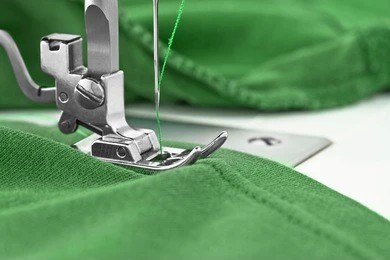 Sewing machine-ah embroidery thread i hmang thei ang em .